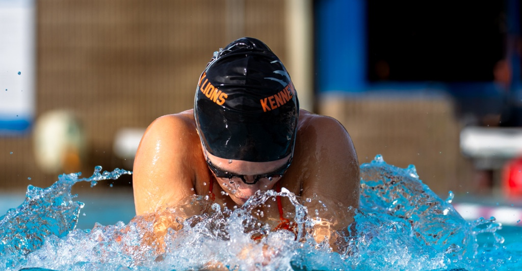 Kennewick swimmer in a landscape action portrait